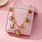 CHARM NECKLACE-HEART FLOWER RHINESTONE CLOVER | 80N92697: GOLD