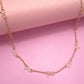 Gold Bow Cutout Necklace